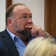 Alex Jones testifying about his text messages, which his lawyers accidentally leaked to the opposing side.